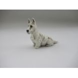 A Royal Worcester model, of a Terrier, Shape No 3029, height 2.5ins