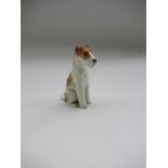 A Royal Worcester model, of a seated Fox Terrier, Shape No 2942, height 2.4ins