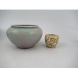 A Ruskin pottery high fired vase, decorated with a mauve, gray blue ground af, height 3.5ins,