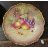 A Royal Worcester cabinet plate, decorated with hand painted fruit by D Shinnie, diameter 10.
