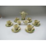 A Clarice Cliff Art Deco tea set comprising tea pot, milk, sugar bowl, six cups and saucers -