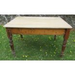A pine kitchen table, height 28.5ins, 33ins x 48ins