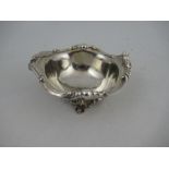 A Victorian silver bowl, with shaped edge, raised on pierced feet, London 1842, maker John