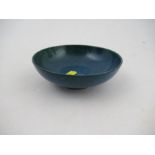 A Ruskin pottery high fired shallow dish, decorated with a Sabrina blue ground, diameter 4.5ins -  I