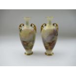 A pair of Royal Worcester vases, decorated with Highland cattle by Harry Stinton, shape number H287,