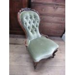 A 19th century showwood framed Grandmother chair, with carved top rail