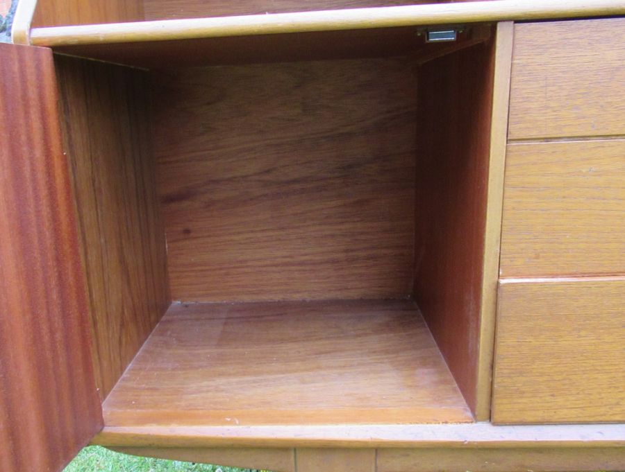 A Retro sideboard, with front flap drinks cabinet, flanked by cupboards with sliding glass doors, - Image 4 of 7