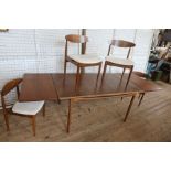 A G Plan mid century extending Dinning Table together with four chairs, length when fully