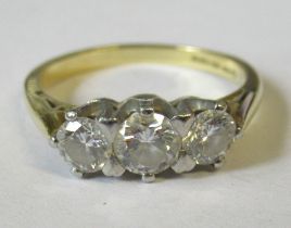 A 18ct three stone diamond ring, with central round brilliant diamond, estimated a 0.50ct and two