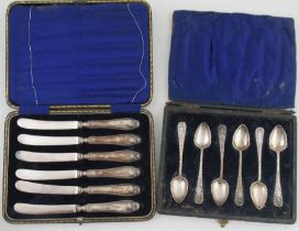 A set of six cased silver tea spoons, weight 3oz, together with a cased set of silver silver handled