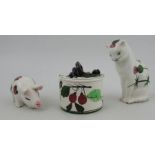 A Plichta Wemyss ware cat, post 1930, decorated with thistles, height 6ins, together with a