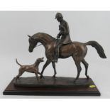 A David Geenty bronze effect model, of a huntsman on horse carrying a terrier with hound at foot, on