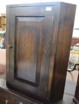 A Heals oak corner cupboard, width 26ins, height 30ins, depth 16.5ins