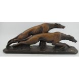 A Bacci & Bacci Art Deco plaster model, of two running grey hounds, length 23.25, height 9.5ins
