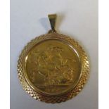 A George V Sovereign, in 9ct gold pendant mount, total weight 10.4g