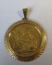 A George V Sovereign, in 9ct gold pendant mount, total weight 10.4g