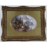 A Royal Worcester framed oval porcelain plaque, decorated with mountain goats in an alpine landscape