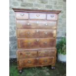 A late 17th century / early 18th century design walnut chest on chest, the upper section having
