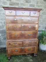 A late 17th century / early 18th century design walnut chest on chest, the upper section having