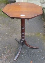 An oak octagonal topped occasional table, diameter 17ins, height 28ins