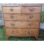 A Georgian mahogany chest, of two short drawers over three graduated long drawers raised on