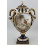 A Royal Worcester ornate two handled covered pedestal vase, decorated to the front with two seated