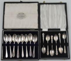A cased set of six hallmarked silver coffee spoons, together with a cased set of six hallmarked