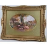 A Royal Worcester framed oval porcelain plaque, decorated with pigs around a pump trough with a tree