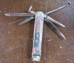 A Victorian silver smokers penknife, fitted with blades, picks, cigar cutter , stamped A. Barrett