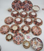 A collection of Imari pattern porcelain, to include a part tea set, a Royal Crown Derby coffee can