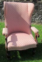 An Edwardian mahogany showwood open armchair, with wing back