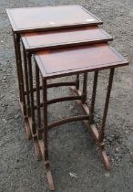 A mahogany nest of three tables, of rectangular form, width 18ins and down, height 27ins and down