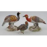 A Meissen model, of a Grouse, height 3.5ins, together with a pair of Continental models of birds -