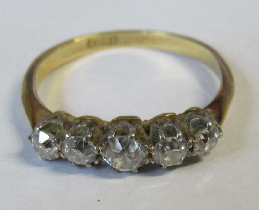 A five stone diamond ring, of graduated old cut diamonds, diamond weight estimated at 0.45ct,