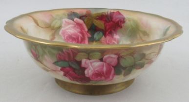 A Royal Worcester Bennett bowl, decorated inside and out with roses by Sedgeley, restored