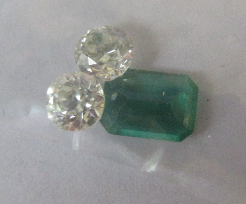 Two loose old cut diamonds (one with small chip to girdle) estimated at 0.20 to 0.25ct each,