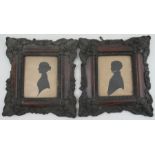 A pair of framed portrait silhouettes, of a man and a woman, 3.75ins x 3.25ins