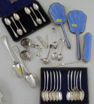 A pair of silver basting spoons, together a set of 11 teaspoons and various other sliver flatware