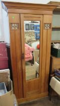 A satinwood single door wardrobe/hall cupboard, with mirror door and pierced glazed panels, width