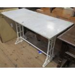 A marble top table, having painted wrought iron base, depth 22ins, width 48ins, height 28ins