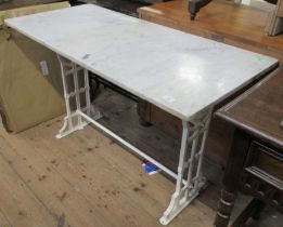 A marble top table, having painted wrought iron base, depth 22ins, width 48ins, height 28ins