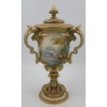 A Royal Worcester after Hadley covered vase, having three handles, decorated with panels of storks