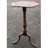 A 19th century walnut and yew wood octagonal topped tripod table, with inlaid and crossband