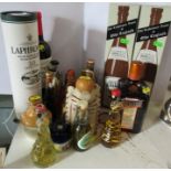 A collection of alcohol and spirits, to include Laphroaig together with Norfolk punch