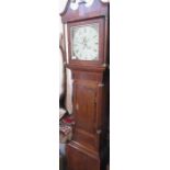 An Antique oak longcase clock, having painted dial, decorated with a bird, indistinctly signed
