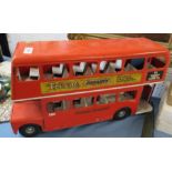 A Tri-Ang London Transport red double decker bus