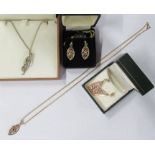 A Clogau 9ct gold pendant on chain, together with matching earrings, another Clogau 9ct Pendant