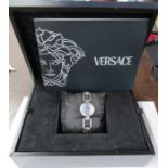 A Versace wrist watch, with box and original paperwork