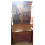 A mahogany bureau bookcase, with glazed upper section and inlaid decoration