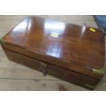 A 19th century walnut writing box, with brass mounted corners, the interior with leather writing